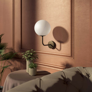 Art Deco wall sconce with frosted glass sphere and curved brass arm, Made in Italy design by Ghidini 1849 - Finish: OBM Bronze Satin Matt Brass