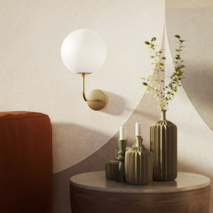Art Deco wall sconce with frosted glass sphere and curved brass arm, Made in Italy design by Ghidini 1849 - Finish: OBV Bronze Satin Light Brass