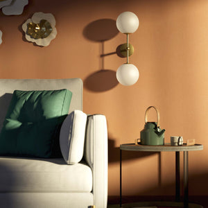 Modern wall light with two frosted glass spheres and vertical brass structure Made in Italy design by Ghidini 1849 - Finish: OBV Bronze Satin Light Brass