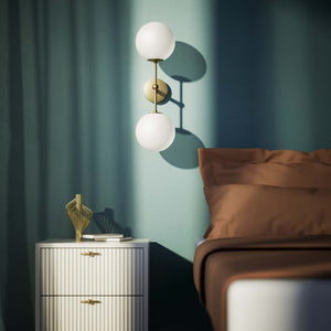 Modern wall light with two frosted glass spheres and vertical brass structure Made in Italy design by Ghidini 1849 - Finish: OBV Bronze Satin Light Brass