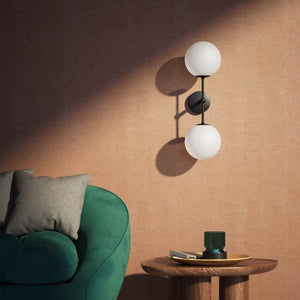 Modern wall light with two frosted glass spheres and vertical brass structure Made in Italy design by Ghidini 1849 - Finish: ONO Matt Black