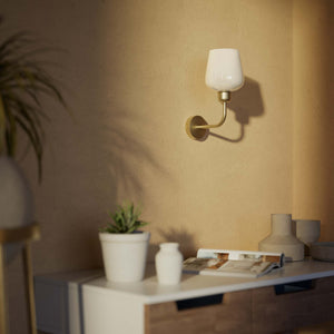 Elegant brass wall lamp with white glass diffuser, perfect for refined interiors by Ghidini 1849 - Finish: OBV Bronze Satin Light Brass