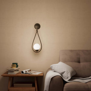 Art Deco teardrop wall sconce in brass with glossy white glass sphere, elegant and refined design for decorative wall lighting by Ghidini 1849 - Finish: OBM Bronze Satin Matt Brass