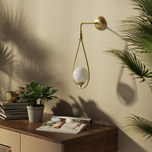 Art Deco teardrop wall sconce in brass with glossy white glass sphere, elegant and refined design for decorative wall lighting by Ghidini 1849 - Finish: OBV Bronze Satin Light Brass