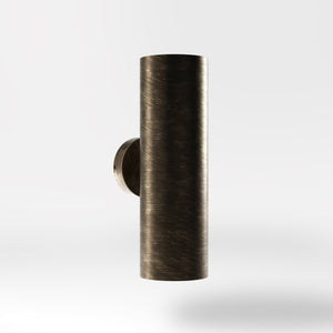 Cylindrical brass wall lamp with up and down light, modern minimalist design by Ghidini 1849 - Finish: OBM Bronze Satin Matt Brass