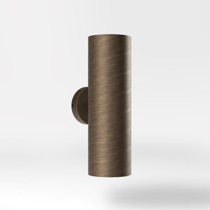Cylindrical brass wall lamp with up and down light, modern minimalist design by Ghidini 1849 - Finish: OBM Bronze Satin Matt Brass