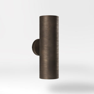 Cylindrical brass wall lamp with up and down light, modern minimalist design by Ghidini 1849 - Finish: OBM Bronze Satin Matt Brass