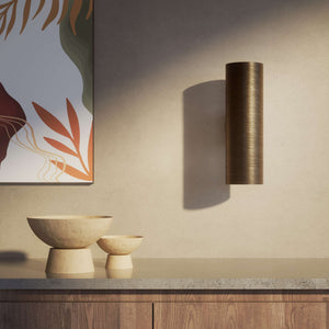 Cylindrical brass wall lamp with up and down light, modern minimalist design by Ghidini 1849 - Finish: OBM Bronze Satin Matt Brass