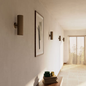 Cylindrical brass wall lamp with up and down light, modern minimalist design by Ghidini 1849 - Finish: OBM Bronze Satin Matt Brass