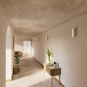 Cylindrical brass wall lamp with up and down light, modern minimalist design by Ghidini 1849 - Finish: OBV Bronze Satin Light Brass