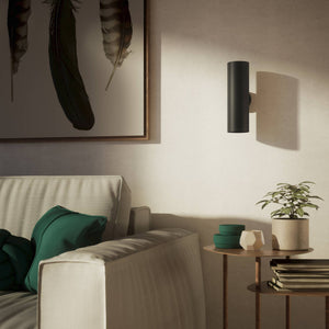Cylindrical brass wall lamp with up and down light, modern minimalist design by Ghidini 1849 - Finish: ONO Matt Black