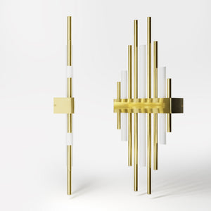 Brass wall lamp with vertical lines for modern and luxurious interiors by Ghidini 1849 - Finish: OLV Polished Brass
