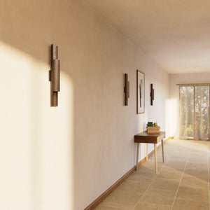 Contemporary brass wall lamp with tubular design, emits light upwards and downwards, ideal for modern spaces by Ghidini 1849 - Finish: OAS Antique Brass