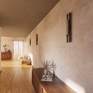 Contemporary brass wall lamp with tubular design, emits light upwards and downwards, ideal for modern spaces by Ghidini 1849 - Finish: OAS Antique Brass