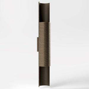 Contemporary brass wall lamp with tubular design, emits light upwards and downwards, ideal for modern spaces by Ghidini 1849 - Finish: OBM Bronze Satin Matt Brass