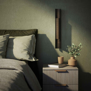 Contemporary brass wall lamp with tubular design, emits light upwards and downwards, ideal for modern spaces by Ghidini 1849 - Finish: OBM Bronze Satin Matt Brass
