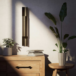 Contemporary brass wall lamp with tubular design, emits light upwards and downwards, ideal for modern spaces by Ghidini 1849 - Finish: OBM Bronze Satin Matt Brass