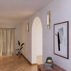Contemporary brass wall lamp with tubular design, emits light upwards and downwards, ideal for modern spaces by Ghidini 1849 - Finish: OBV Bronze Satin Light Brass