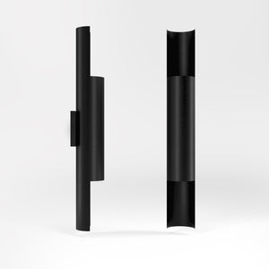Contemporary brass wall lamp with tubular design, emits light upwards and downwards, ideal for modern spaces by Ghidini 1849 - Finish: ONO Matt Black