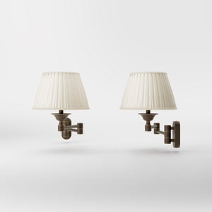 Brass wall lamp with ivory fabric lampshade and adjustable arms for elegant interior spaces by Ghidini 1849 - Finish: OBM Bronze Satin Matt Brass