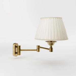 Brass wall lamp with ivory fabric lampshade and adjustable arms for elegant interior spaces by Ghidini 1849 - Finish: OBS Bronze Satin Brass