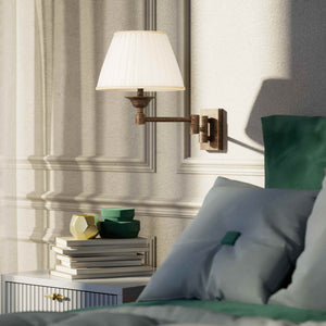 Double joint wall lamp with base and arm articulation, ivory pleated fabric shade, elegant design - Finish: OAS Antique Brass