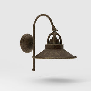 Industrial brass wall lamp with curved arm and adjustable conical shade, vintage style for functional lighting by Ghidini 1849 - Finish: OAS Antique Brass