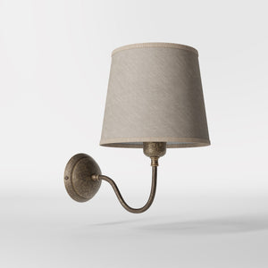 Brass wall light with a grey linen fabric shade, classic design, ideal for elegant and cozy interiors by Ghidini 1849 - Finish: OAS Antique Brass