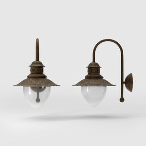 Nautical style wall lamp with curved brass arm and clear glass diffuser, Italian design inspired by ancient port lanterns by Ghidini 1849 - Finish: OAS Antique Brass