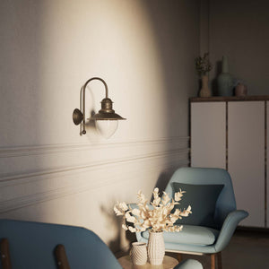 Nautical style wall lamp with curved brass arm and clear glass diffuser, Italian design inspired by ancient port lanterns by Ghidini 1849 - Finish: OBM Bronze Satin Matt Brass