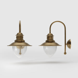 Nautical style wall lamp with curved brass arm and clear glass diffuser, Italian design inspired by ancient port lanterns by Ghidini 1849 - Finish: OBS Bronze Satin Brass