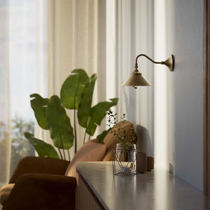 Retro brass wall lamp with articulated arm and adjustable conical shade for directional vintage lighting by Ghidini 1849 - Finish: OAS Antique Brass