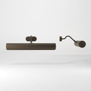 Brass picture light with reflector, adjustable arm, and minimalist design. Perfect for illuminating artwork in elegant interiors by Ghidini 1849 - Finish: OBM Bronze Satin Matt Brass