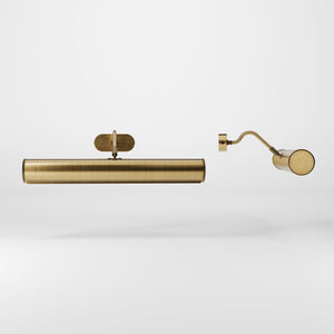 Brass picture light with reflector, adjustable arm, and minimalist design. Perfect for illuminating artwork in elegant interiors by Ghidini 1849 - Finish: OBS Bronze Satin Brass