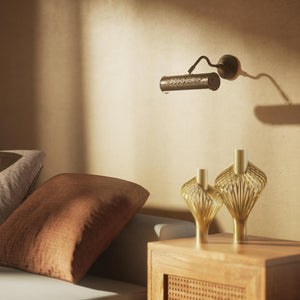 Picture wall lamp in brass with floral relief pattern, adjustable arm and circular base for artwork illumination by Ghidini 1849 - Finish: OAS Antique Brass