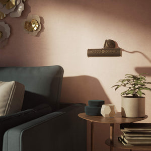 Picture wall lamp in brass with floral relief pattern, adjustable arm and circular base for artwork illumination by Ghidini 1849 - Finish: OBM Bronze Satin Matt Brass