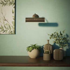 Picture wall lamp in brass with floral relief pattern, adjustable arm and circular base for artwork illumination by Ghidini 1849 - Finish: OBM Bronze Satin Matt Brass