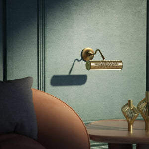 Picture wall lamp in brass with floral relief pattern, adjustable arm and circular base for artwork illumination by Ghidini 1849 - Finish: OBS Bronze Satin Brass