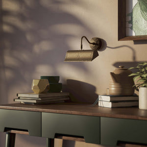 Baroque brass picture wall lamp with ornaments, decorative rosette and adjustable arm for artistic lighting by Ghidini 1849 - Finish: OBM Bronze Satin Matt Brass