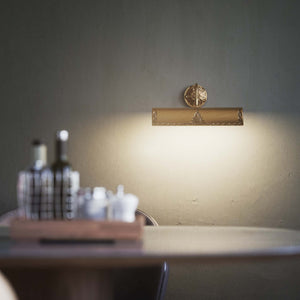 Classical brass picture wall lamp 30 cm with rocaille decorations, floral rosette and adjustable arm by Ghidini 1849 - Finish: OBS Bronze Satin Brass