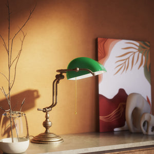 Banker’s lamp in brass with adjustable green glass shade, classic style, ideal for elegant and functional interiors by Ghidini 1849 - OAS Antique Brass