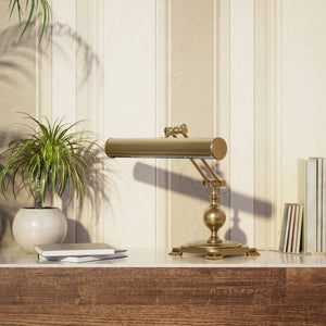 Executive brass desk lamp with cylindrical shade and dual articulation points mounted on decorative square base with spherical accent by Ghidini 1849 - Finish: OBS Bronze Satin Brass