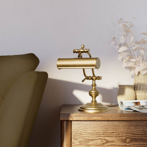 Brass study lamp with adjustable cylindrical shade on turned base with concentric moldings and dual joint system by Ghidini 1849 - Finish: OBS Bronze Satin Brass