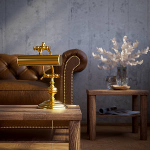 Brass study lamp with adjustable cylindrical shade on turned base with concentric moldings and dual joint system by Ghidini 1849 - Finish: ORO 24K Gold Plated