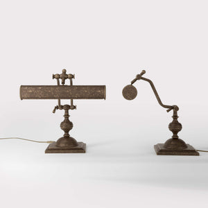Vintage brass table lamp with adjustable cylindrical shade and articulated arm on square base with turned element by Ghidini 1849 - Finish: OAS Antique Brass