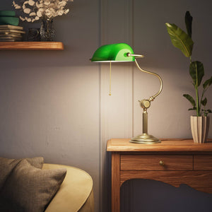 Classic brass banker desk lamp with green glass shade articulated arm and stepped base with fluted column by Ghidini 1849 - Finish: OBV Bronze Satin Light Brass