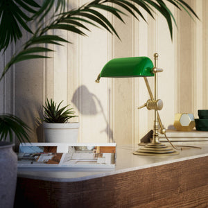 Mini brass desk lamp with green glass shade sliding arm on stem and turned circular base by Ghidini 1849 - Finish: OBV Bronze Satin Light Brass