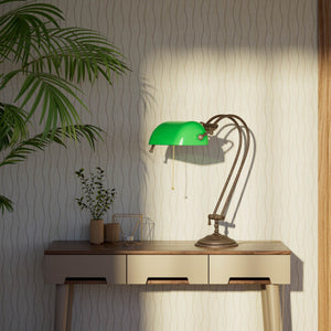 Classic banker's desk lamp with green glass shade and adjustable brass structure featuring dual joints and pull chain switch by Ghidini 1849 - Finish: OAS Antique Brass