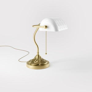 Art Nouveau table lamp with pierced white ceramic shade decorated brass base with floral motifs and pull chain by Ghidini 1849 - Finish: OBV Bronze Satin Light Brass