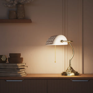 Art Nouveau table lamp with pierced white ceramic shade decorated brass base with floral motifs and pull chain by Ghidini 1849 - Finish: OLV Polished Brass